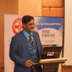 Dr. Prakash Kurmi receiving recognition for his contributions to healthcare, diabetes awareness, and social service initiatives in India.
