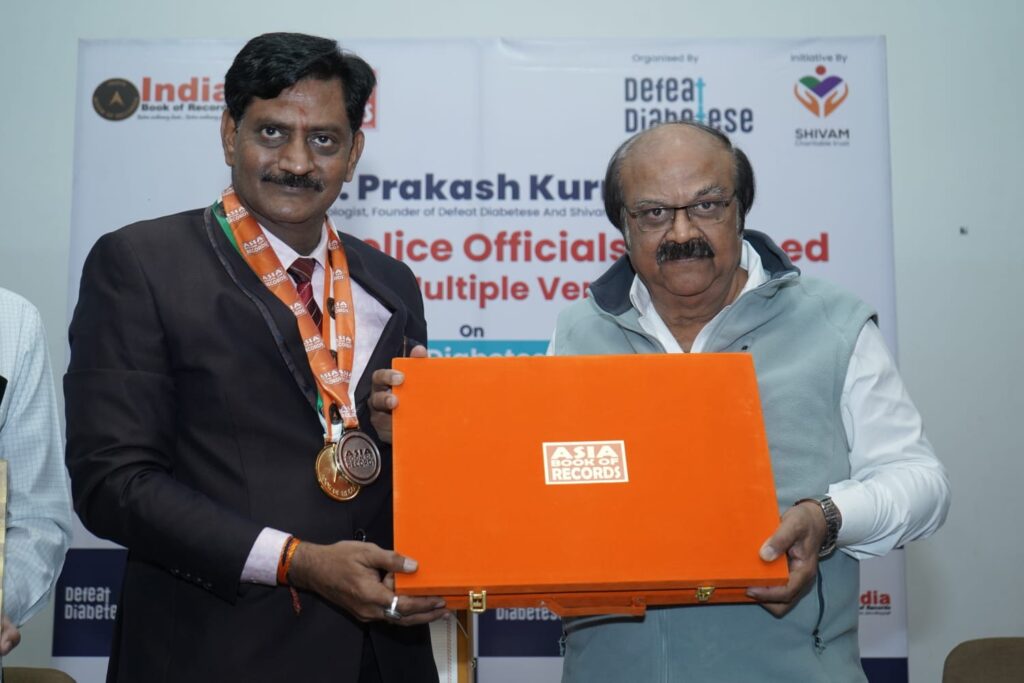 Dr. Prakash Kurmi, MBBS, MD (Medicine), FIDM (Senior Diabetologist), being honored for his exceptional contribution to healthcare and social welfare. As the Founder of Shivam Charitable Trust and DEFEAT DIABETESE – “એક યુદ્ધ ડાયાબિટીસ વિરુદ્ધ”, he has dedicated over 30 years to diabetes care, community healthcare, BSF welfare initiatives, educational support programs, and public health awareness campaigns, positively impacting more than 100,000 lives across India.