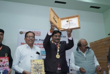 Dr. Prakash Kurmi receiving an award in recognition of his outstanding contribution to healthcare, diabetes awareness, and social service initiatives.