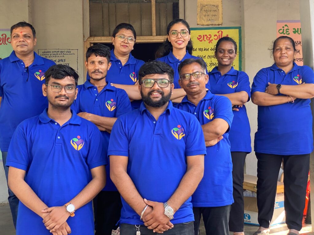 Mega Health Camp Sujana Muvada organized by Shivam Charitable Trust for free diabetes, BP, and eye check-up services in rural villages.