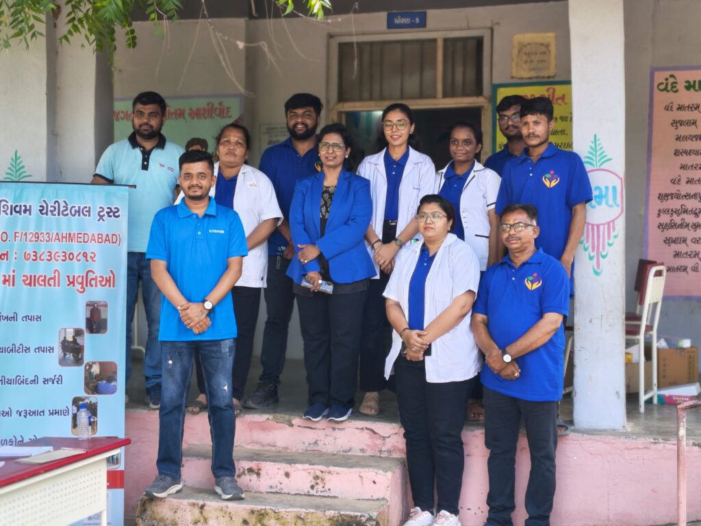 Mega Health Camp Sujana Muvada organized by Shivam Charitable Trust for free diabetes, BP, and eye check-up services in rural villages.