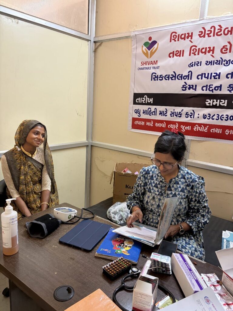 Shivam Charitable Trust conducting a Sickle Cell patient consultation and follow-up healthcare camp in Dahod tribal communities.