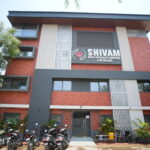 Shivam Multispeciality Hospital building in Ahmedabad providing advanced healthcare and monthly free health camps.