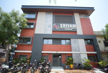 Shivam Multispeciality Hospital building in Ahmedabad providing advanced healthcare and monthly free health camps.