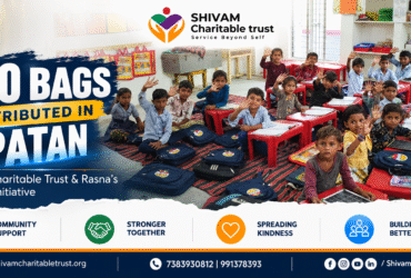 Shivam Charitable Trust and Rasna distribute approximately 450 bags in Patan, Gujarat, as part of a community welfare initiative.